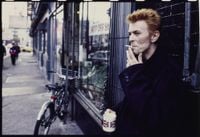 David Bowie in front of Tea & Sympathy in New York City by Kevin Cummins contemporary artwork photography