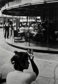 Woman and Carousel, Coney Island by Louis Draper contemporary artwork photography