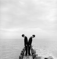 Twins Leaning Outward on Dock no.1, Sherwood Island, CT by Rodney Smith contemporary artwork photography