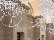 Neon scribbles by Cerith Wyn Evans hang in London's Tate Britain