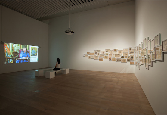 Dinh Q. Lê, Light and Belief: Sketches of Life from the Vietnam War, 2012. 100 drawings: pencil, watercolor, ink, and oil on paper / single-channel color video with sound. Dimensions variable; 35 min. Collection: Carnegie Museum of Art, Pittsburgh, The Henry L. Hillman Fund, 2013.37.1-102. Exhibition view: “Dinh Q. Lê: Memory for Tomorrow,” Mori Art Museum, Tokyo, 2015. Photo: Nagare Satoshi. Photo