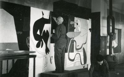 'Le Corbusier drawing the cartoon for Traces de pas dans la nuit next to Pierre Baudouin', (1951). Courtesy the Estate and Almine Rech. © F.L.C. / ADAGP, Paris / Artists Rights Society (ARS), New York 2022. Photo: André Villers.