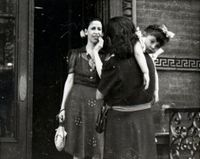 Untitled (Two women and a girl by a doorway) by Helen Levitt contemporary artwork photography
