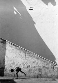Boy playing in street, Italy by Thomas Hoepker contemporary artwork photography