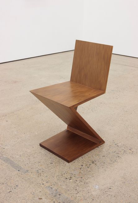 A Zig-Zag Chair designed by Gerrit Rietveld in 1934 and reproduced using 45,910 year-old swamp kauri wood in 2015 by Simon Starling contemporary artwork