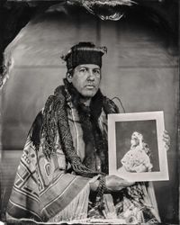 Talking Tintype: Andy Everson, Citizen of the K'ómoks First Nation, Holds Photograph of his Grandmother, by Edward S. Curtis, Who Played the Role of Princess Naida in Curtis' Film In the Land of the Headhunters, CIPX Seattle Art Museum by Will Wilson contemporary artwork photography