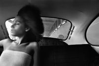 Ann Young in VW Bug, Manhattan by Chester Higgins contemporary artwork photography