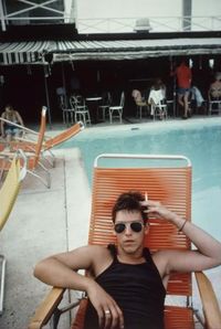 David by the pool at The Black Room, Provincetown by Nan Goldin contemporary artwork photography, print