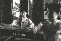 Untitled (Practicing Guzheng) by Larry Silver contemporary artwork photography