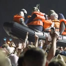 Banksy Floats Refugee Boat Across Crowds at Glastonbury