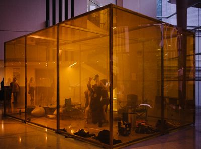 Alicia Frankovich Stages Performance in Wildfire-Orange Cube