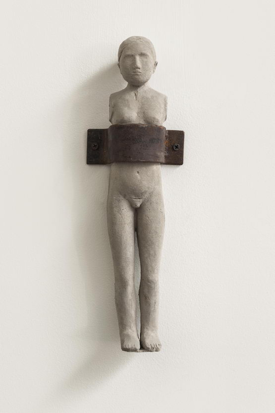Yu Ji, Tiny Figure - Female, 2012. Cement and iron.