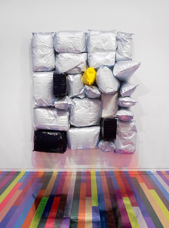 Jim Lambie, Other Side of the Sun, 2015. Potato bags, acrylic paint, expanding foam on canvas. 210 x 178 x 60 cm. Image