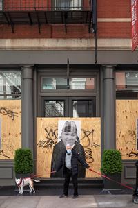 Man with Dogs, SoHo, Mercer Street, NYC, 12 May 2020 by Sean Hemmerle contemporary artwork photography, print