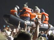 Banksy Floats Refugee Boat Across Crowds at Glastonbury