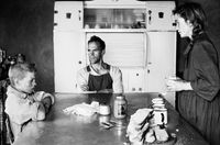 A plot-holder, his wife and their eldest son at lunch, Wheatlands, Randfontein by David Goldblatt contemporary artwork photography