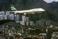 Cathay Pacific 747-300 passing Kowloon Walled City, Hong Kong by Greg Girard contemporary artwork photography