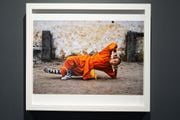 Young monk practicing Shaolin, one of the oldest styles of Kung Fu, Shaolin Monastery, Henan Province, China by Steve McCurry contemporary artwork 2