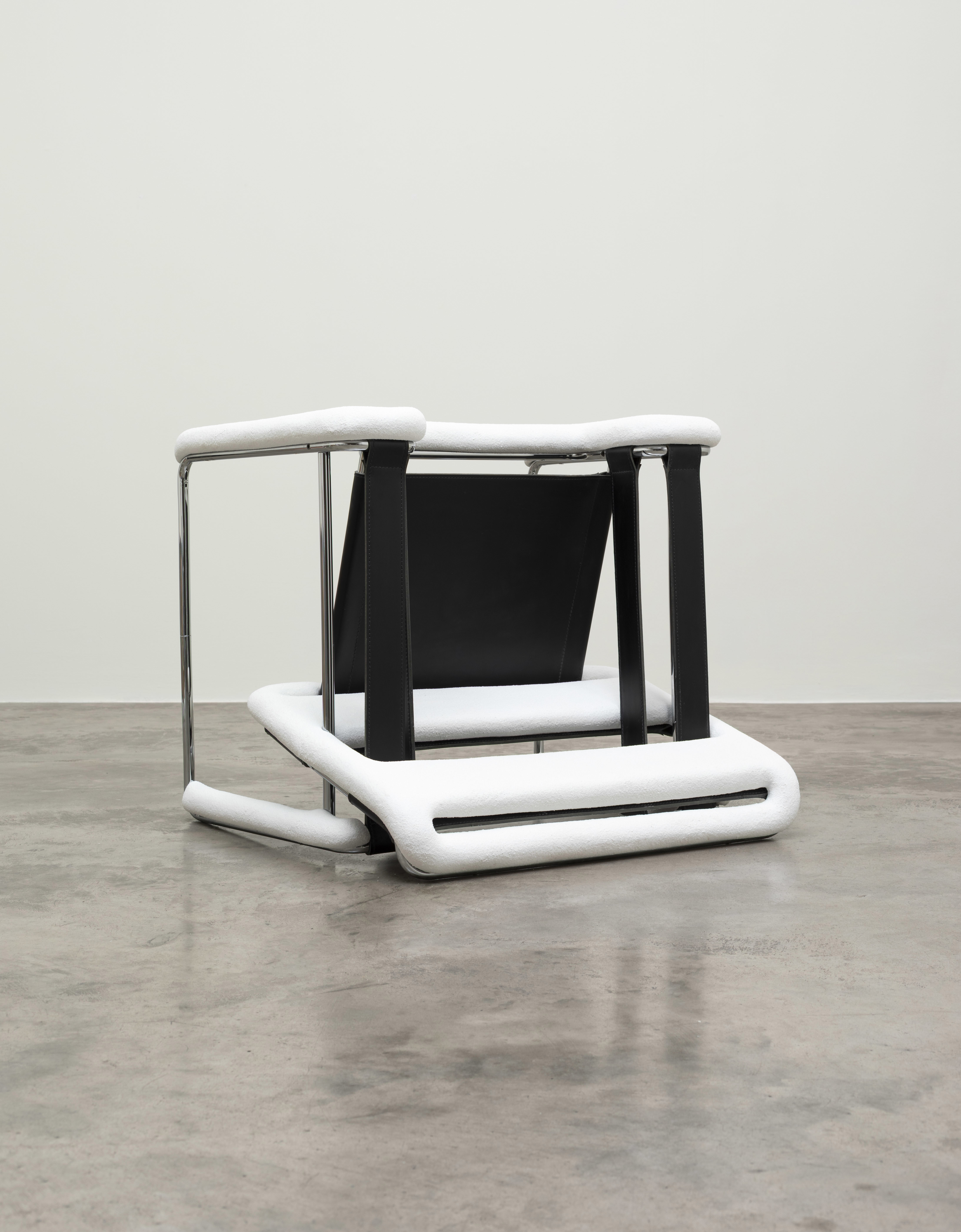 Overturned Breuer chair after a blizzard of snow, 2024 by Ryan