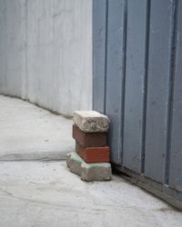 Gray Gate and Bricks in a Back Alley by Seongyeon Jo contemporary artwork photography