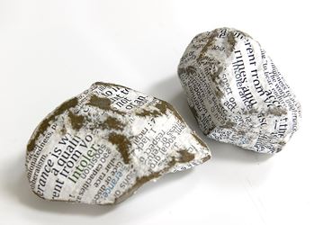 Stefana McClure, Protest Stones (Brexit) (2016). Paper-wrapped stones. Left 6 x 11 x 8 cm, right 9 x 12 x 9 cm. Courtesy Bartha Contemporary. 