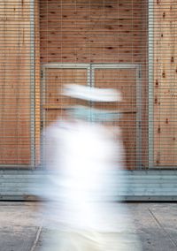 Man in White Suit, Fourteenth Street, NYC, 3 June 2020 by Sean Hemmerle contemporary artwork photography, print