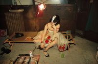 Trixie on the cot, NYC by Nan Goldin contemporary artwork photography