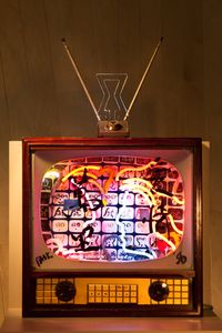 Neon TV - Love is 10,000 miles by Nam June Paik contemporary artwork sculpture, mixed media