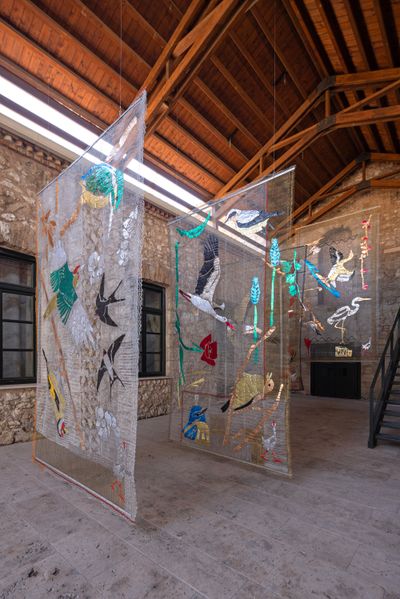 Maria Loizidou, Volant Migrants (2023). Handwoven metal thread 260 × 312 cm, 225 × 395 cm, 350 x 208 cm, 225 x 340 cm. Commissioned by the Musée de la Chasse et de la Nature, Paris 2023.