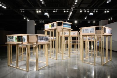 Couch (Hiroki Miyazaki and Reiko Asao), A fable of a fable <Wildcat> (2021–2025). Wood, inkjet print on paper, inkjet print on transparency film, remodeled toy train, AA battery. Exhibition view: Group Exhibition, 2025 Taoyuan International Art Award, Taoyuan Arts Center, Taoyuan (26 March–18 May 2025).