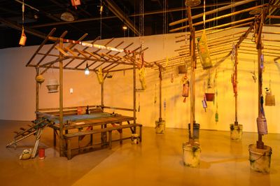 Working Hard (Kuo Po Yu and She Wen Ying), Sleep in Fish (Ikan Kapan Bobok) (2024). Bucket, fishing lure, lighting, line, mesh wire, water, paint, rope, second-hand furniture, sugar, sugary drinks, wood, and other found objects. Exhibition view: Group Exhibition, 2025 Taoyuan International Art Award, Taoyuan Arts Center, Taoyuan (26 March–18 May 2025).