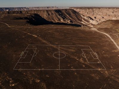 Ayman Yossri Daydban, A rock garden in the shape of a full-sized soccer field (2024). Exhibition view: Desert X AlUla (9 February–23 March 2024).