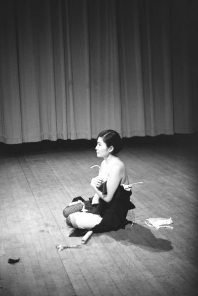 Yoko Ono, Cut Piece (1964). Performance view: New Works by Yoko Ono, Carnegie Recital Hall, New York (21 March 1965). Photo: © Minoru Niizuma.