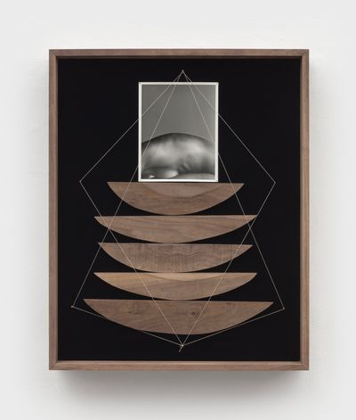 Sheree Hovsepian, Belonging (2022). Silver gelatin photograph, wood, string, nails, walnut artist frame. 80 x 31.8 x 9.9 cm.