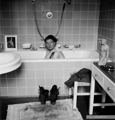 Lee Miller and David E. Scherman, Lee Miller in Hitler’s bathtub, Hitler’s apartment, 16 Prinzregentenplatz, Munich, Germany (1945).
