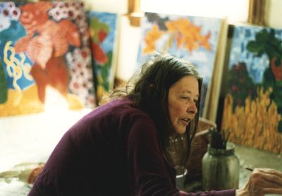 Lynne Drexler signing paintings in her home studio, c.1998.