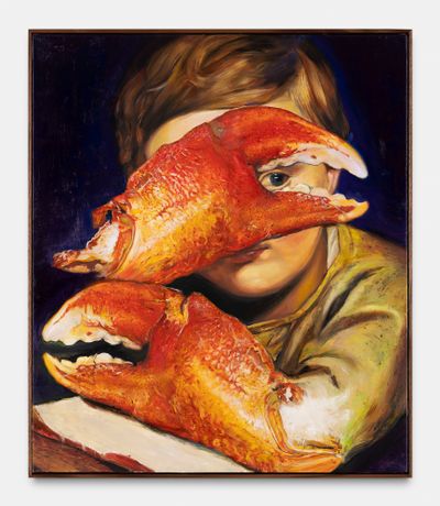 A young boy is painted with an arm that transforms into a large crab claw at his elbow, covering his face. The boy peaks through the claw towards the viewer with one eye.