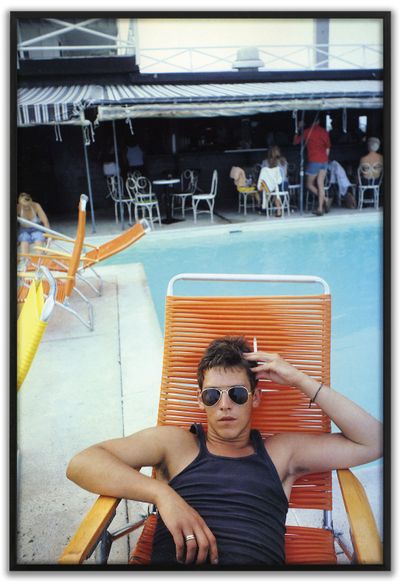 Nan Goldin, David by the pool at The Black Room, Provincetown (1976). Archival pigment print. 116.8 x 78.7 x 4.8 cm. Edition of 25.
