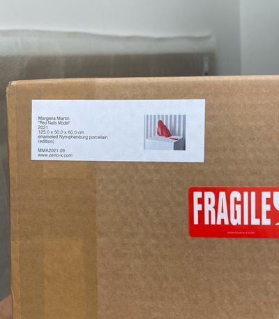 Martin Margiela, box containing Red Nails Model (2021).