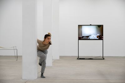 Sylvie Cox performing Zoo by Eisa Jocson. Exhibition view: My Body Holds Its Shape, Tai Kwun Contemporary, Hong Kong (25 May–27 September 2020). Commissioned by Tai Kwun Contemporary.