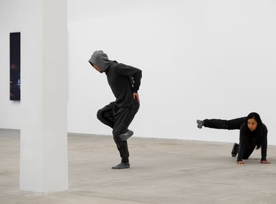 Yang Hao and Sudhee Liao performing Zoo by Eisa Jocson. Exhibition view: My Body Holds Its Shape, Tai Kwun Contemporary, Hong Kong (25 May–27 September 2020). Commissioned by Tai Kwun Contemporary.