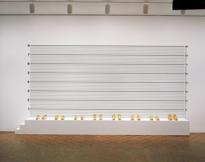Gary Simmons, Lineup (1993). Synthetic polymer on wood, gold-plated shoes. 289.6 x 548.6 x 45.7 cm. Exhibition view: Whitney Biennial, Whitney Museum of American Art, New York (4 March–20 June 1993).