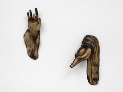 Tuan Andrew Nguyen, The Offering Of A Sentient Cry (2019). Hand-carved gmelina wood. Left hand: 67.3 x 39.8 x 22.9 cm; Right hand: 69.9 x 22.9 x 15.2 cm.