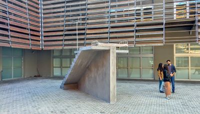 Hiwa K, One Room Apartment (2017). Wood, cement, metal. 644 x 332 x 684 cm. Exhibition view: documenta 14, Benaki Museum Pireos Street, Athens (8 April–16 July 2017). Photo: Jens Maier-Rothe.