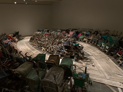 Nari Ward, Amazing Grace (1993). Baby strollers, fire hose, and audio component. Dimensions variable. Exhibition view: We the People, New Museum, New York (13 February–26 May 2019). Courtesy New Museum. Photo: Maris Hutchinson/EPW Studio.