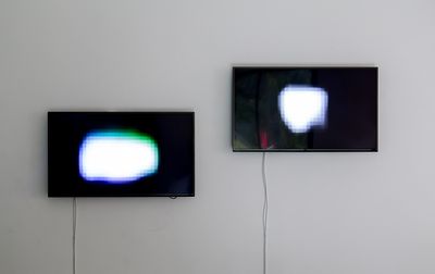 Pak Sheung Chuen, That Two Spots of Light (2006–2016). 3 channel video installation. Exhibition view: Pak Sheung Chuen: That Light, Mirrored Gardens, Vitamin Creative Space, Guangzhou (17 December 2016–26 February 2017). Courtesy Vitamin Archive.