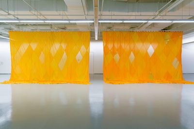 Sriwhana Spong, Villa America (2012). Silk dyed in Fanta. 1600 x 463 cm. Exhibition view: Sriwhana Spong and Maria Taniguchi: Oceanic Feeling, ICA Singapore (20 August–16 October 2016). Courtesy the artists, Michael Lett, Auckland; ICA Singapore.