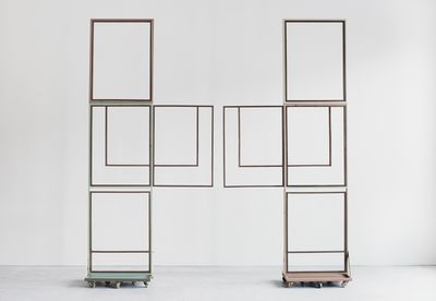 Suki Seokyeong Kang, Jeong (2014–2015). Assembled units, painted steel, wood frame, wood wheel. Dimensions variable. Courtesy the artist, One and J. Gallery and Tina Kim Gallery.
