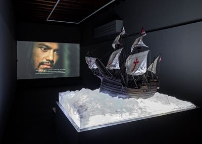 Ahmad Fuad Osman, Enrique de Malacca Memorial Project (2016–ongoing). Mixed media installation: 73 objects; two single-channel videos: colour, sound; 33 interactive video interviews, archival materials. Dimensions variable. Exhibition view: Leaving the Echo Chamber, Sharjah Biennial 14 (7 March–10 June 2019). Commissioned by Sharjah Art Foundation. Courtesy the artist. Photo: Sharjah Art Foundation.
