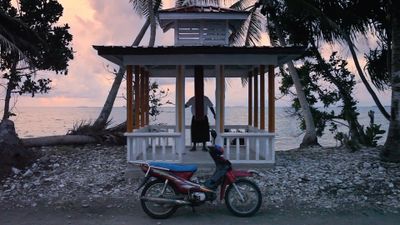 Angela Tiatia, Tuvalu (2016) (still). Three-channel High Definition video 16:9, colour, sound. 20 min 32 sec.